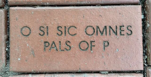 brick with o si sic omnes printed on it